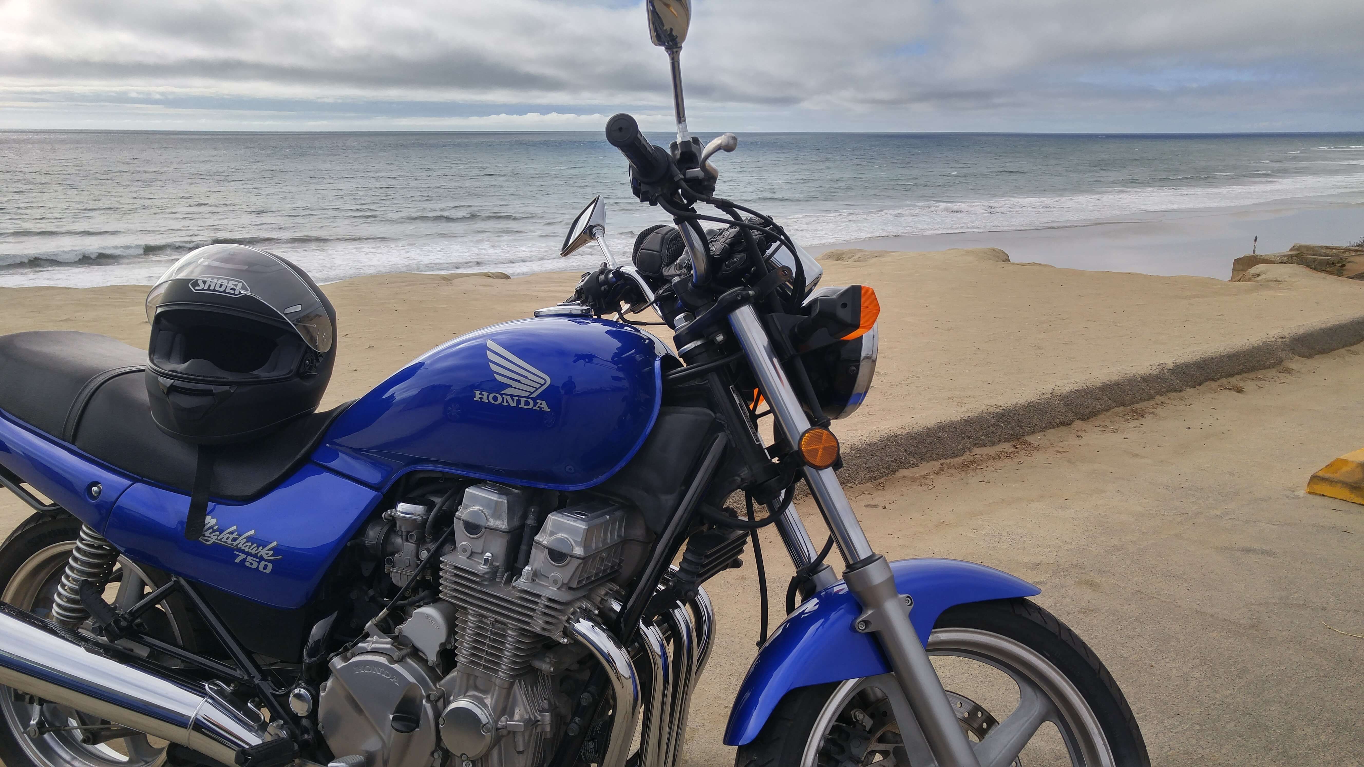 1993 Honda Nighthawk motorcycle at a Southern California beach